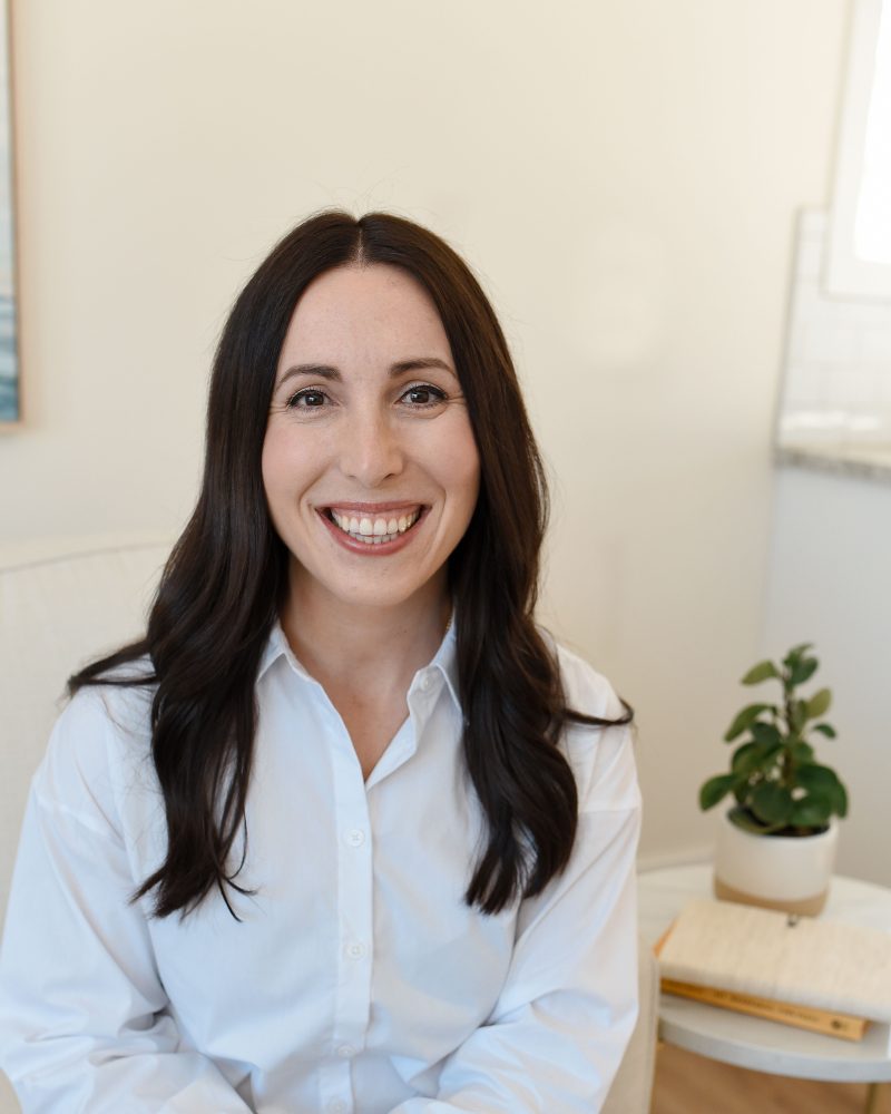 Jacqueline Gokavi smiling in her Saskatoon counselling office